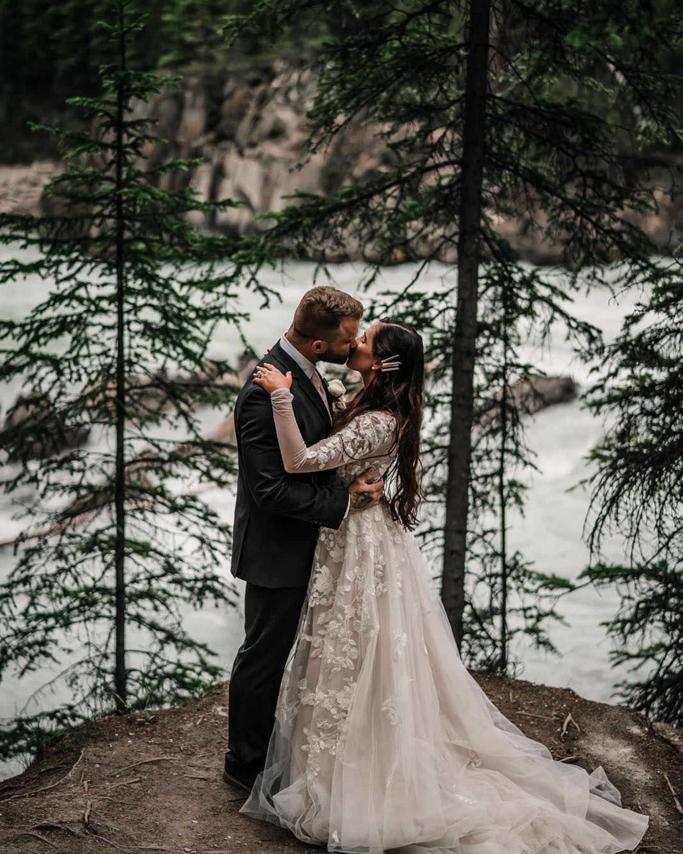 bride and groom on a mountain
