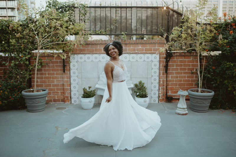Bride twirling in wedding dress